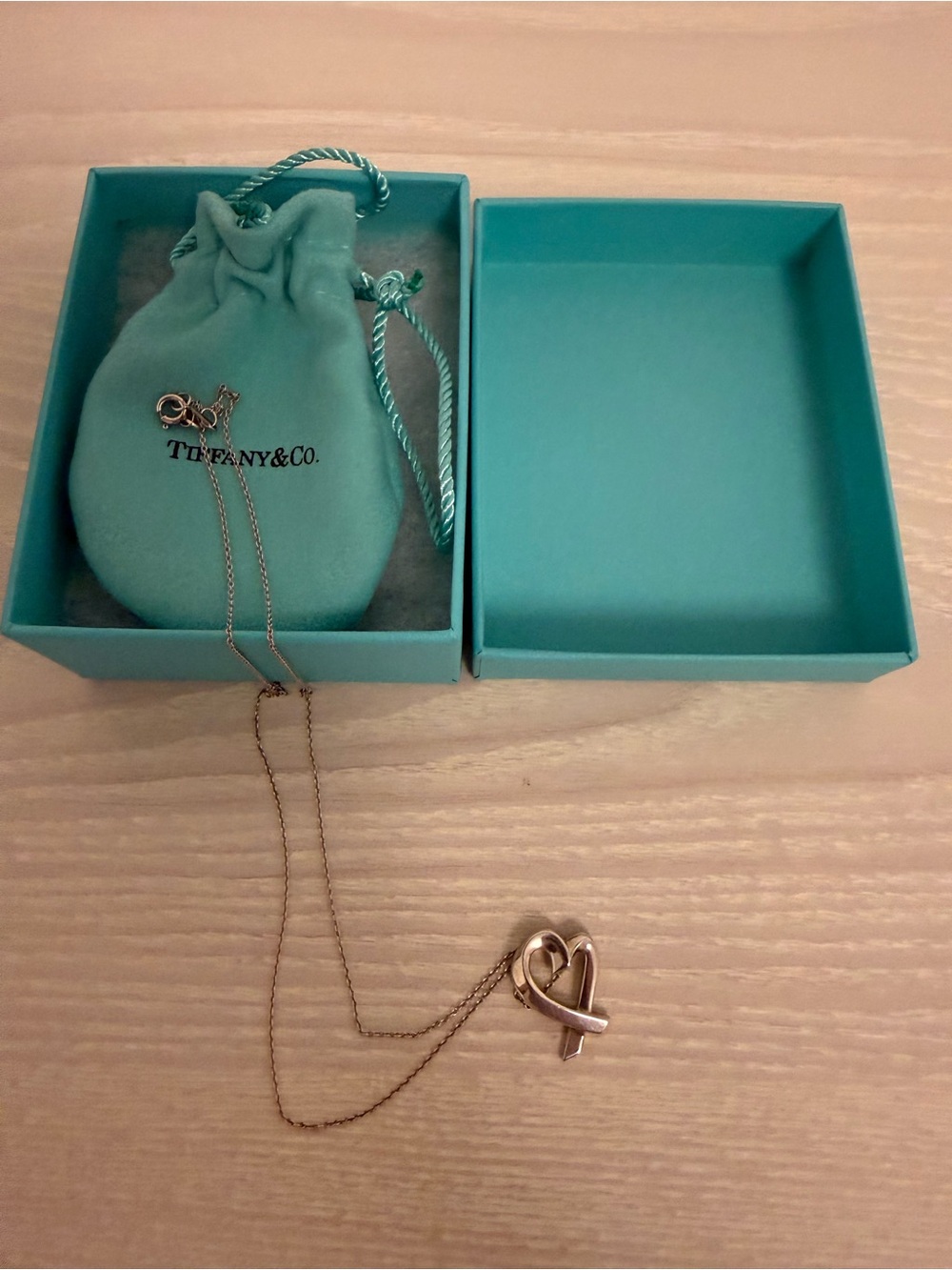 Tiffany & Co. Sterling Silver Heart Ribbon Necklace with Signature Blue Box